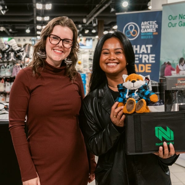 Catherine Newsome (Northwestel) and Leneath Yanson (Casino Mining) at the 2026 Arctic Winter Games six months out celebration.