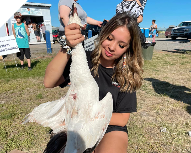 Reanna Goose Plucking at the 2024 Northern Games (Photo credit: Northern Games)