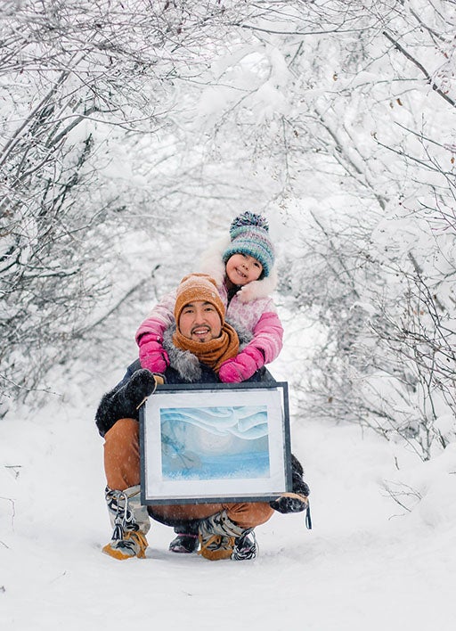 Brian and his niece on a snowy trail.