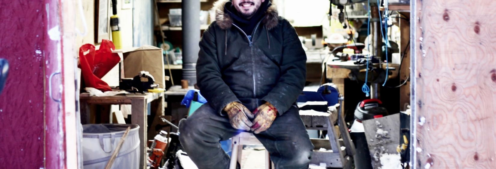 Nooks sitting in his workshop in Arviat, Nunavut Nooks sitting in his workshop in Arviat, Nunavut