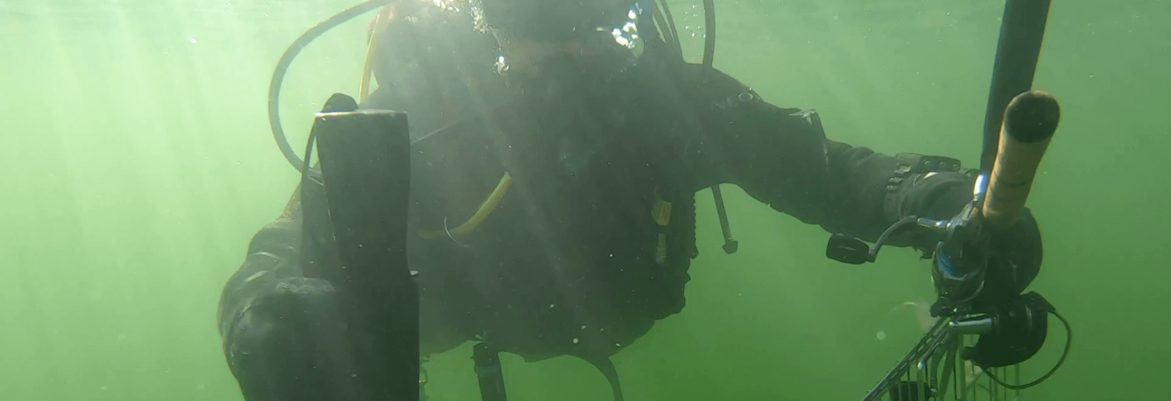 Diver underwater with find Diver underwater with find