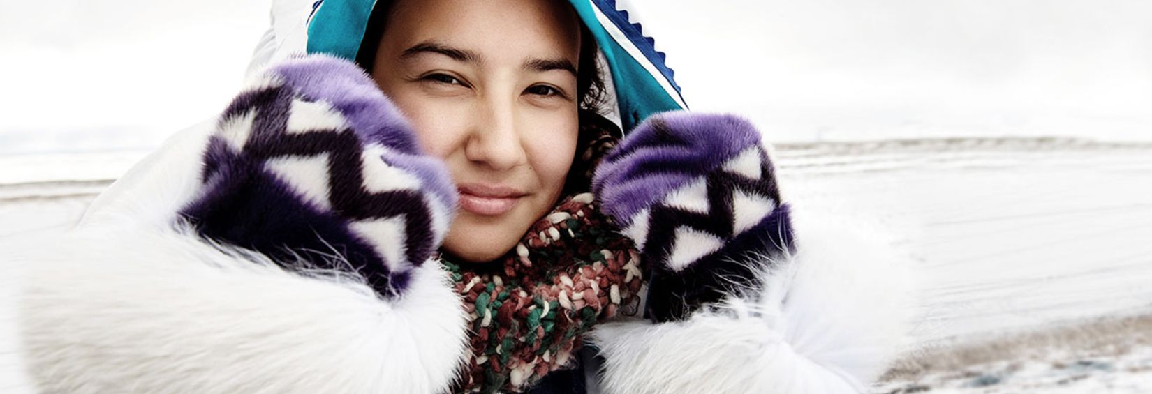 Jennifer showcasing her hand-made amauti Women in Nunavut with hand-made amauti