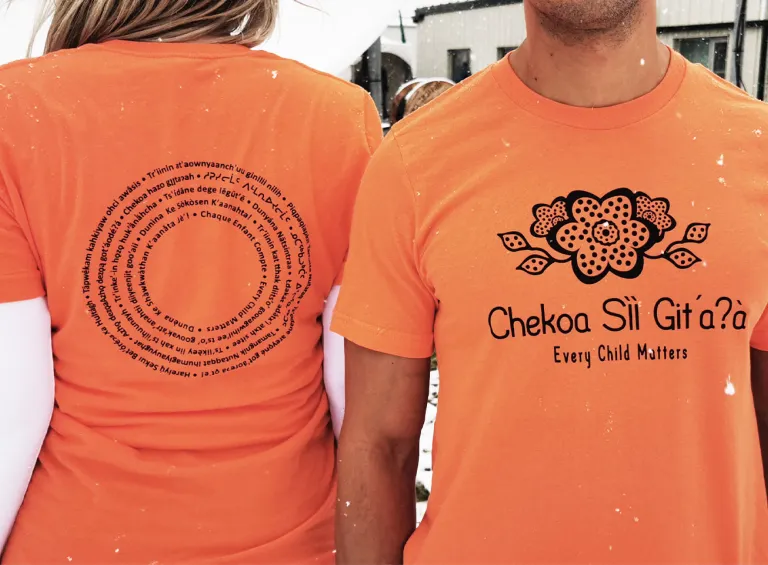Northern made Orange Shirt by Sarah Erasmus Northern made Orange t-shirts by Sarah Erasmus front and back of shirt