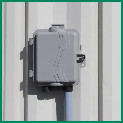 Network interface device mounted to exterior wall